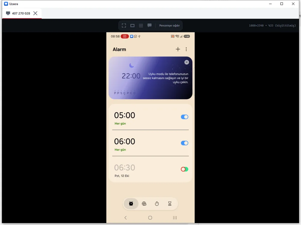 Bilgisayardaki Uzaera penceresinde Android telefonun ekranı görüntüleniyor